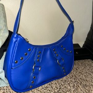 Blue stud purse